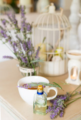 Obraz na płótnie Canvas Lavanda essential oil for aromatherapy/ Wellness concept/ Provence french style/ Soft focus /Toned