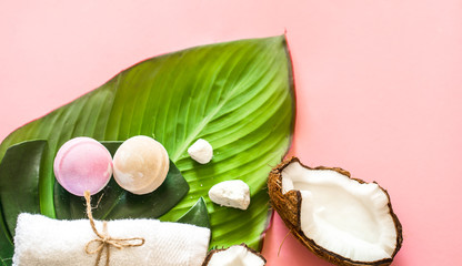 Fototapeta na wymiar Beautiful Spa composition with coconut on pink background