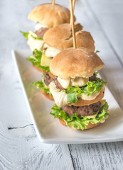 Burgers on the white plate