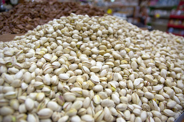 Fototapeta premium Assorted dried fruits at bazaar.Assortment of organic dry, dried fruits, counter on the food market, organic healsy healthy snack, selective focus