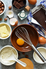 Ingredients for cooking Brownie. A classic American dessert. Cooking process pie.