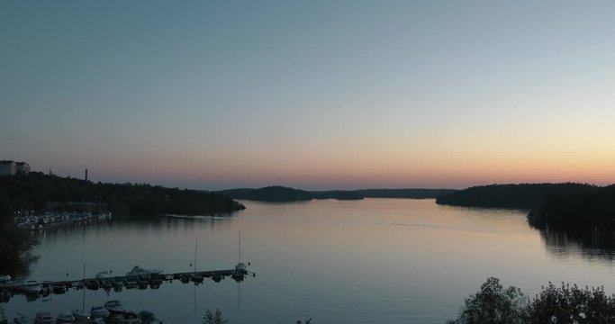 Sunset over a calm lake in suburbian Stockholm