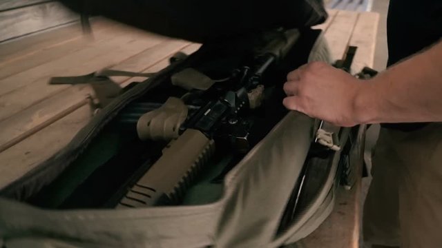 Semi-automatic rifle. Tactical backpack for carrying cold steel.