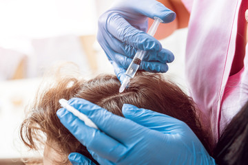 Platelet rich plasma injection procedure. Hair growth stimulation.