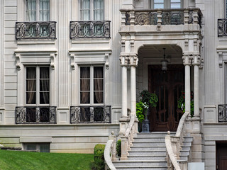 Fototapeta premium European 19th century style architecture, entrance to large house or apartment building