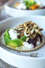 Tortilla with avocado, fresh cheese, beetroot and oyster mushrooms