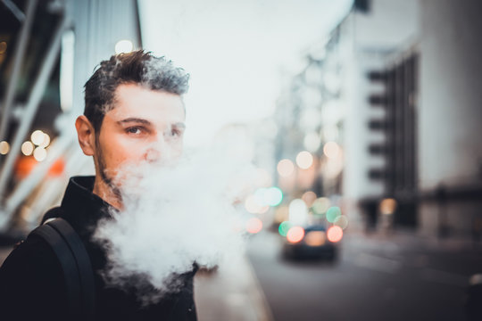 Man vaping on the street