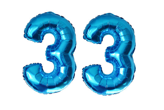 Preparing for 33 years old party with blue shiny inflatable balloons isolated on white background

