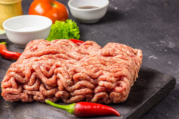 raw minced meat. ingredients for burger