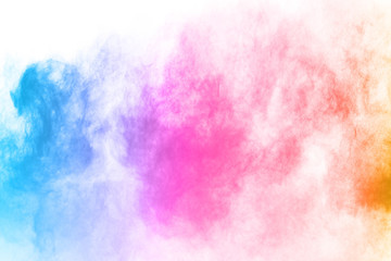 Fototapeta premium abstract powder splatted background. Colorful powder explosion on white background. Colored cloud. Colorful dust explode. Paint Holi.