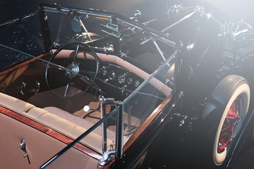 Steering wheel and part of interior of the retro