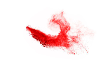 Freeze motion of red powder exploding, isolated on white background. Abstract design of red dust cloud. Particles explosion screen saver, wallpaper