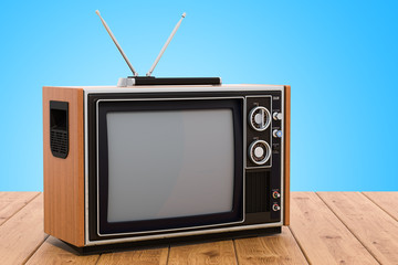 Retro TV set on the wooden table. 3D rendering