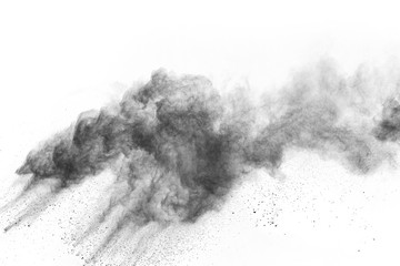 particles of charcoal on white background,abstract powder splatted on white background,Freeze motion of black powder exploding or throwing black powder.
