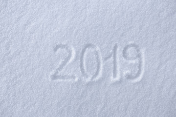2019. Writings on the snow. Happy new year. Beautiful cold sunny winter day.