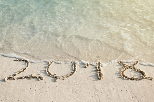 numbers 2018 on  tropical sandy beach