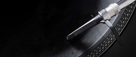 Turntable with black record and headshell