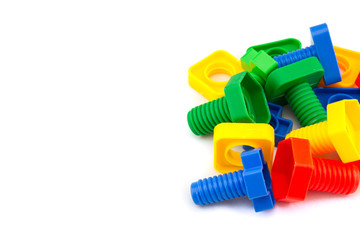 Colorful and funny nuts and bolts toys isolated on white background