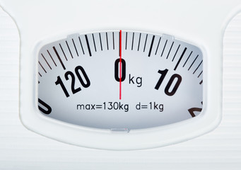 Bathroom scale on white background. Weight loss concept. Weight control by floor scale