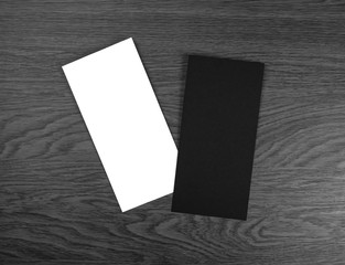 Blank flyer over wooden background to replace your design.