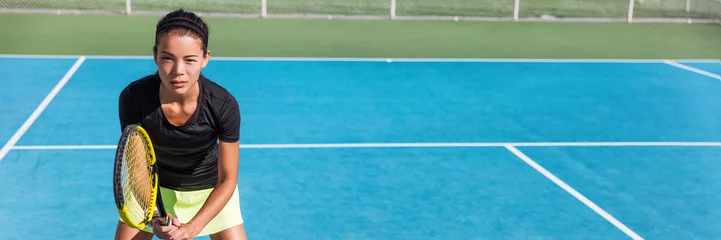 Rolgordijnen Tennis playing woman. Tennis class outdoor lesson. Sport player blue hard court banner panorama. © Maridav