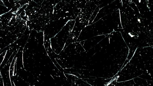 Real glass break in super slow motion shooted with high speed cinema camera at 2000 fps. Isolated on black.