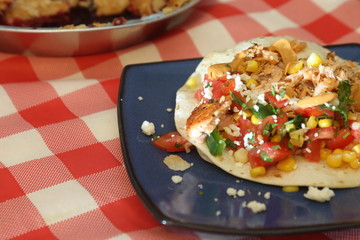 open face tostada with salmon and corn salsa