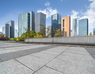 Panoramic skyline and buildings with empty square floor.