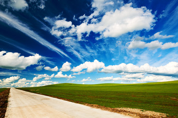 The road on the summer grassland of Hulunbuir, China.