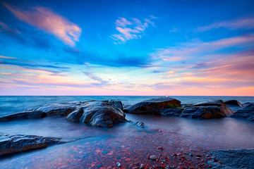 Beautiful Sunset and blue sky at rocky Brighton Beach, Duluth, Minnesota