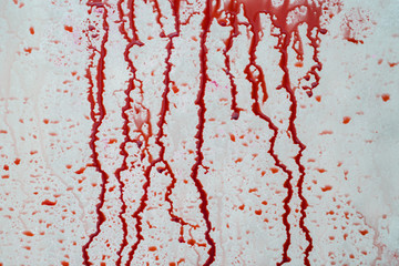 Blood liquid splattered on the wall