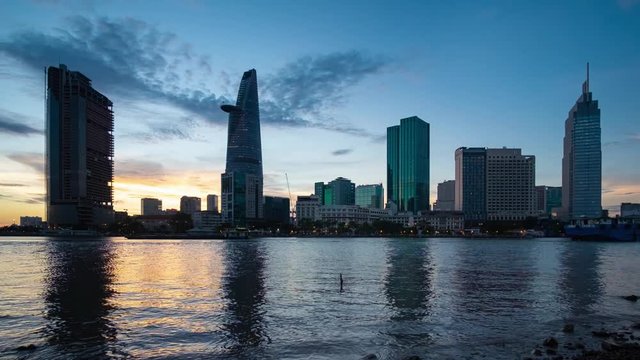 Timelapse landscape sunset to night of Ho Chi Minh city or Sai Gon. Royalty high quality free stock footage time lapse of Ho Chi Minh City in sunset to night.  Timelapse or time lapse is fast video