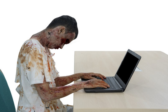Male worker transforming into a zombie on studio
