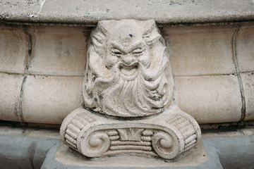 bas-relief stone face