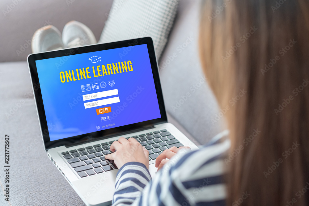 Poster close up back woman online learning log in on webpage with laptop at sofa in home,e-learning concept