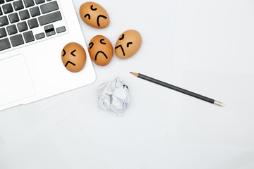 Unhappy employee in working place.