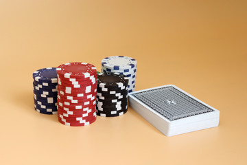 The pile of casino chips and a pile of cards.