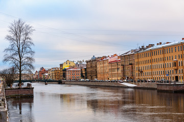 Fototapeta premium Embankment of Fontanka River and Krasnoarmeysky bridge in Saint Petersburg, Russia