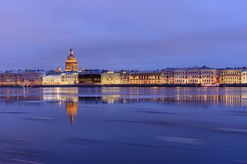 Fototapeta na wymiar Admiralty embankment and St Isaac's Cathedral at night. Saint Petersburg. Russia