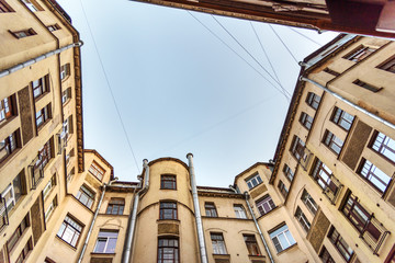 Fototapeta na wymiar Courtyard-well. The bottom view upwards. Saint Petersburg, Russia
