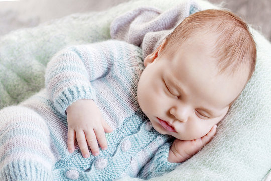 Portrait of sleeping newborn baby boy