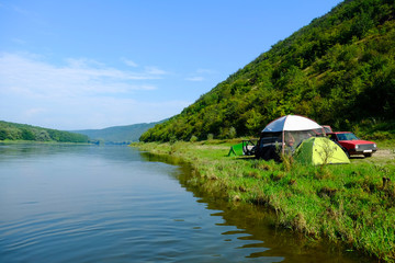 camping on the river bank