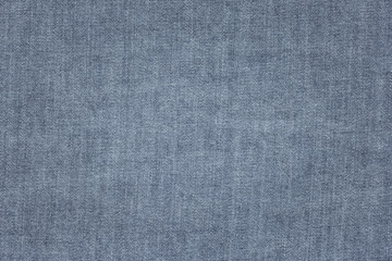 Fototapeta na wymiar Old blue denim jeans texture or background with visible fibers 