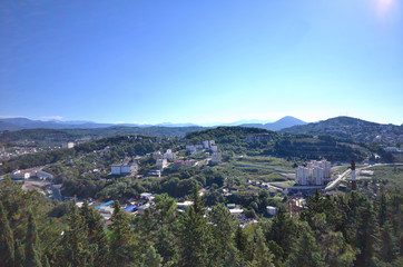 Fototapeta na wymiar Cityscape of Sochi and mountains