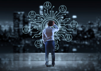 Businessman watching thin line social network icons interface