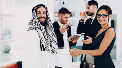 Arabian Businessman Handshake With A Manager.