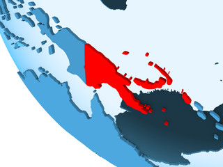 Obraz premium Papua New Guinea on blue political globe