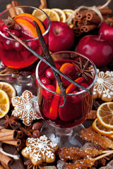 Christmas hot drink in glass and gingerbread cookies