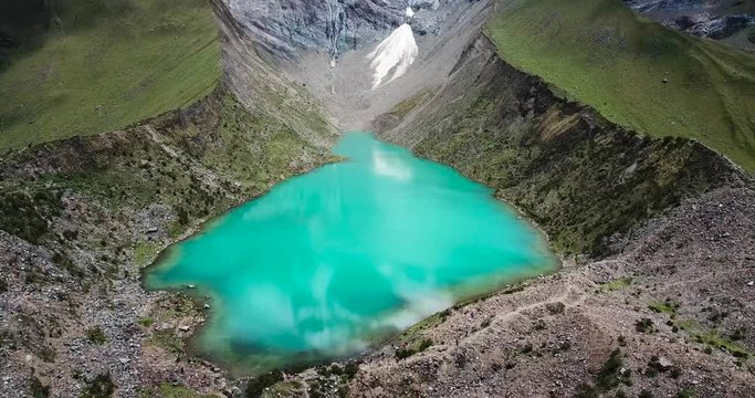 Humantay lake in Peru on Salcantay mountain in the Andes at 5473m altitude, aerial video