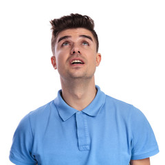 Fototapeta premium young casual man looks up